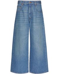 Valentino Garavani - VLogo Chain Jeans mit weitem Bein - Lyst