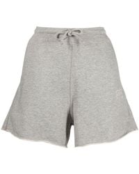 Ganni - Pantalones cortos con logo bordado - Lyst