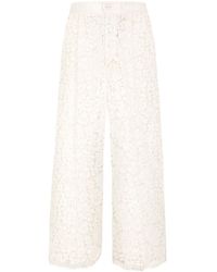 Dolce & Gabbana - Pantaloni ampi in pizzo a fiori - Lyst