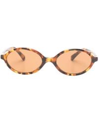 Miu Miu - Tortoiseshell-Effect Oval-Frame Sunglasses - Lyst