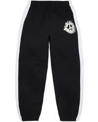 DENIM TEARS - U-Paneled Track Pants - Lyst