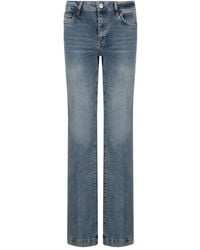 Caractere - Logo-patch Jeans - Lyst