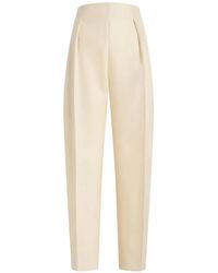 KHAITE - Somera Pleated Pressed-Crease Trousers - Lyst