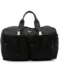 Prada - Reisetasche Aus Re-Nylon Mit Logo-Schild - Lyst