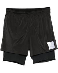 Satisfy - Layered Logo-Print Shorts - Lyst