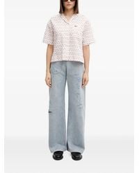 Lacoste - Blouse Met Tennisracket-Print En Korte Mouwen - Lyst