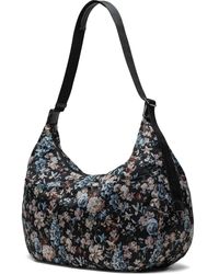 Herschel Supply Co. - Yara Schultertasche mit Blumen-Print - Lyst