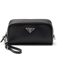 Prada - Enamel-Logo Saffiano Leather Clutch Bag - Lyst