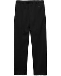 Prada - Technical Jersey Pants - Lyst