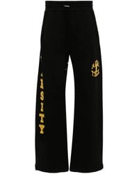 Amiri - Flocked-Logo Cotton Track Pants - Lyst