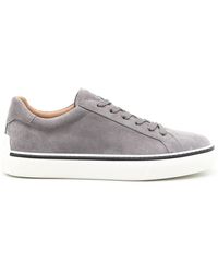 Tod's - Sneakers con logo goffrato - Lyst