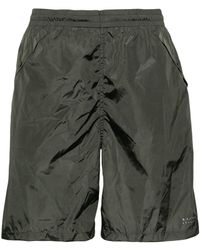 Moncler - Logo-appliqué swim shorts - Lyst