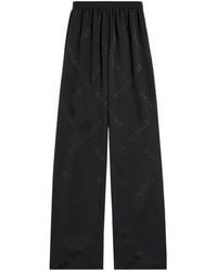 Balenciaga - Pantaloni a gamba ampia con logo jacquard - Lyst