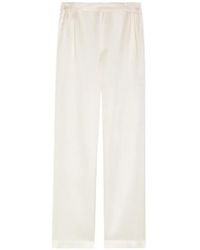 Delos - Gilbert Pleated Silk Trousers - Lyst