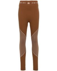 Amiri - Logo-waistband Panelled leggings - Lyst