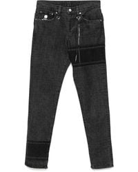 MASTERMIND WORLD - Vaqueros skinny con logo bordado - Lyst