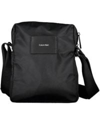 Calvin Klein - Logo-Patch Messenger Bag - Lyst