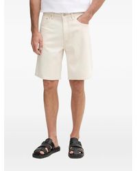 Guess - Logo-Patch Denim Shorts - Lyst