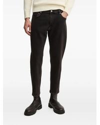 Sisley - Five-Pocket Tapered Jeans - Lyst