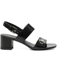 Tory Burch - Turnlock Heeled Sandals - Lyst