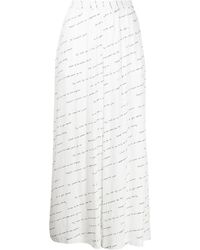 Rosetta Getty - Pantalones de seda con eslogan estampado - Lyst
