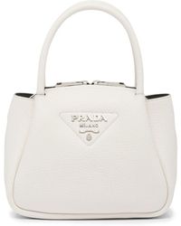 Prada - Logo-embellished Leather Mini Bag - Lyst