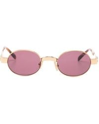 Miu Miu - Lunettes De Soleil Ovales À Plaque Logo - Lyst