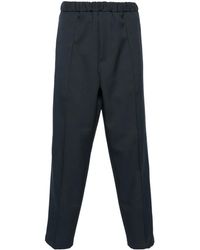 Jil Sander - Pantalones ajustados con cinturilla elástica - Lyst