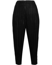 Pleats Please Issey Miyake - Tapered Pleated Trousers - Lyst