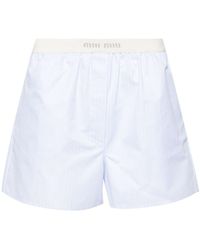 Miu Miu - Shorts pigiama a righe con banda logo - Lyst