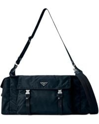 Prada - Explore Re-Nylon And Leather Duffel Bag - Lyst