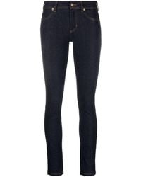 Versace - Halbhohe Skinny-Jeans - Lyst