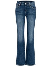 TRUE RELIGION - Faded Bootcut Jeans - Lyst