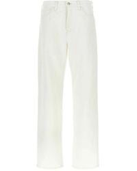 Carhartt - Logo-Patch Cotton Jeans - Lyst