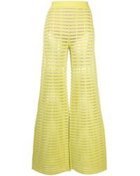 Genny - Semi-sheer Flared Trousers - Lyst