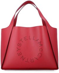 Stella McCartney - Logo Studded Vegan Leather Tote Handbag - Lyst
