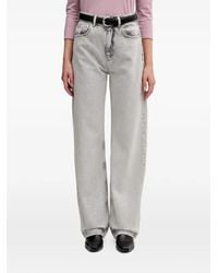 Sisley - Logo-Patch Jeans - Lyst