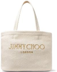 Jimmy Choo - Strandtasche aus Bast mit Logo-Stickerei - Lyst