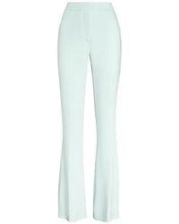 Genny - Flared Trousers - Lyst