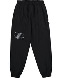 WTAPS - Pantalones con bajos rasgados - Lyst