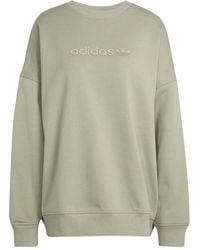 adidas - Sudadera Essentials Linear con logo - Lyst
