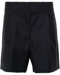 Miu Miu - Pantalones cortos con logo bordado - Lyst