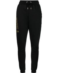 Alpha Industries - Pantalones de chándal con logo estampado - Lyst