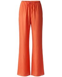 Toccin - Nela Drawstring Flared Trousers - Lyst