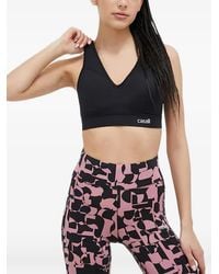 Casall - V-Neck Logo-Patch Sports Bra - Lyst