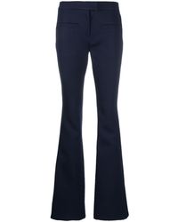 Courreges - Logo-patch Flared Trousers - Lyst