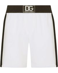 en zwemshorts Heren Kleding voor voor Strandkleding voor Board Dolce & Gabbana Zwembroek Met Logoprint in het Zwart voor heren 