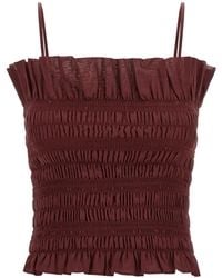 ANDAMANE - Suri Smocked Ruffled Sleeveless Top - Lyst