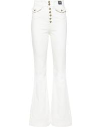 Versace - High-rise Flared-leg Cotton-blend Jeans - Lyst