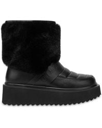 Love Moschino - Logo-Embossed Slip-On Boots - Lyst